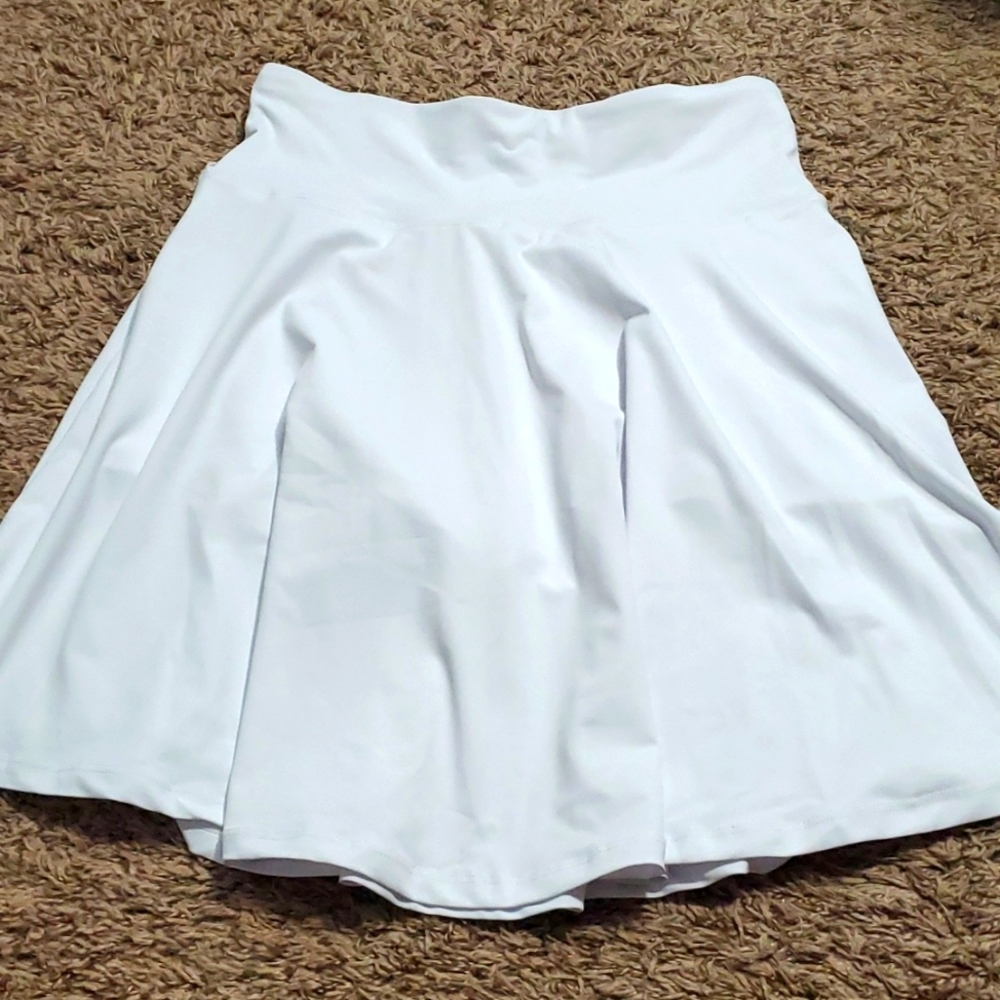 Tennis, golf Skirt white medium with tags with pockets inside shorts